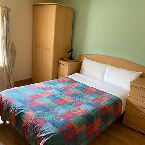 Kamer met een Queen Size Bed